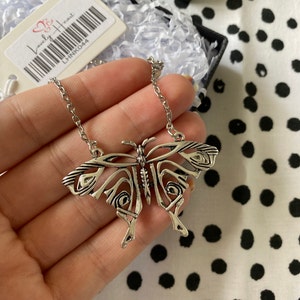 Donna's butterfly necklace in mamma mia hot sale