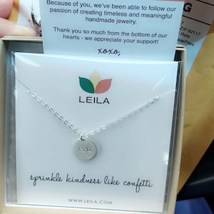 Adrienne added a photo of their purchase