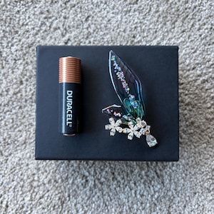 Elaine added a photo of their purchase