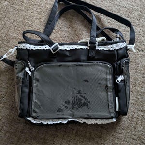 Lola added a photo of their purchase
