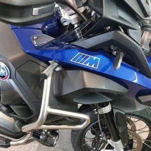 Alex added a photo of their purchase