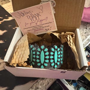 Ashley added a photo of their purchase