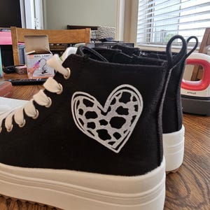 Courtney added a photo of their purchase