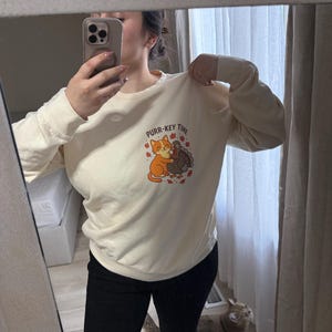 Maria added a photo of their purchase