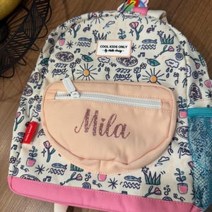 LAURA added a photo of their purchase