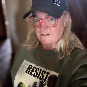 Angela added a photo of their purchase