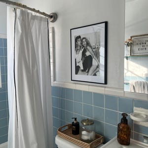 Gina added a photo of their purchase