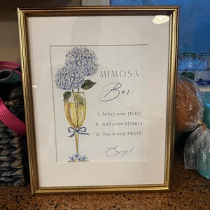 Mindy added a photo of their purchase