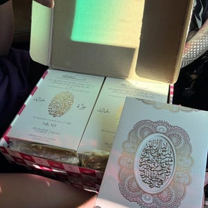 Khalid added a photo of their purchase
