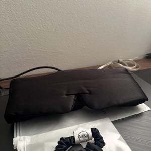 Naomi added a photo of their purchase