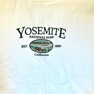 Embroidered Comfort Colors Tee - 2 Birth Flower w/ White Thread (center)