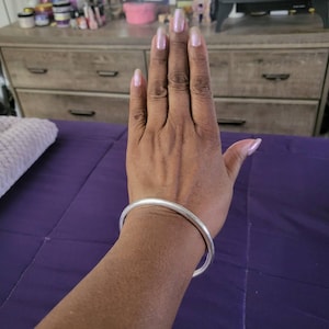 Roxanne added a photo of their purchase