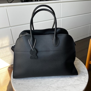 Mitsuko added a photo of their purchase