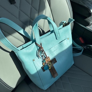 Lizzy added a photo of their purchase