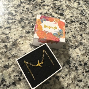 Customer photo, Airplane Necklace