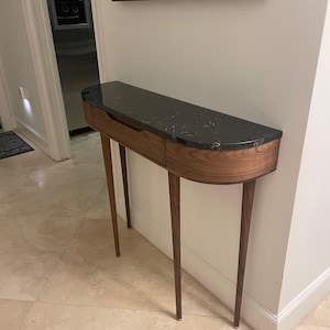Hilton added a photo of their purchase