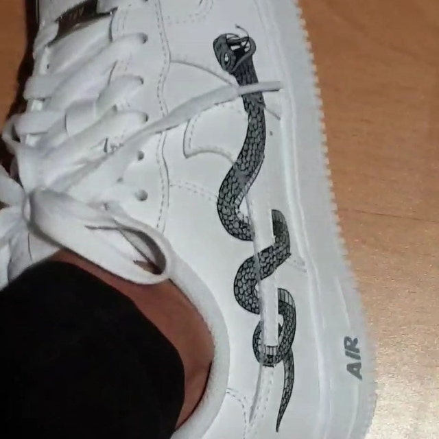 snake print nike trainers