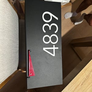 Sarah added a photo of their purchase