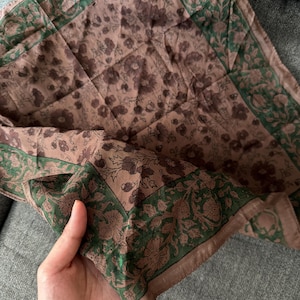 MAXINE added a photo of their purchase