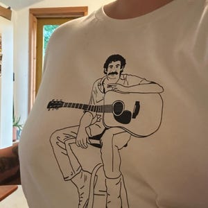 Colleen added a photo of their purchase