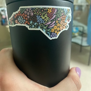Courtney added a photo of their purchase