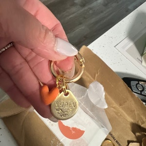 Etsy のお客さま さんが購入した商品の写真を追加しました
