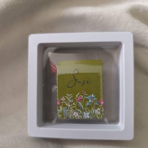 Alexandra added a photo of their purchase