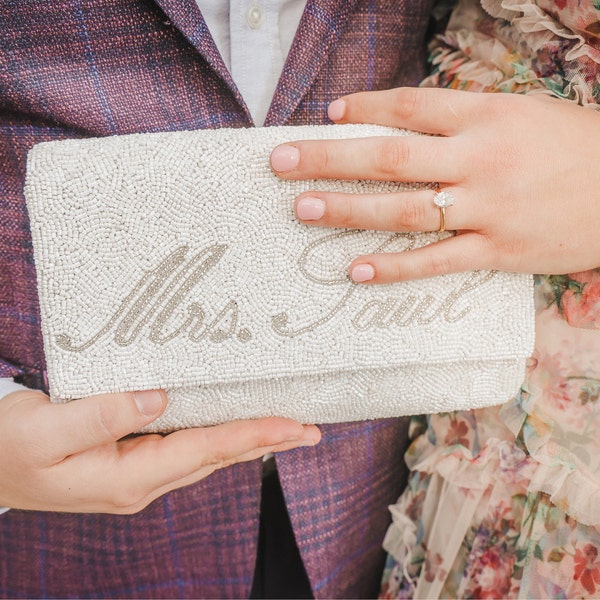 Woven Clutch Bag with Flower Detail and Outer Pocket