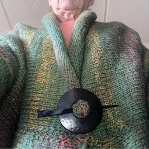 Mona added a photo of their purchase