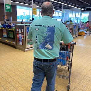 Sandi added a photo of their purchase