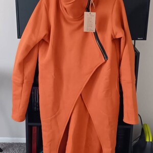 Tee heeft een foto van de aankoop toegevoegd