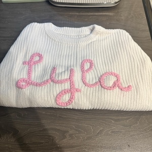 Sarah added a photo of their purchase