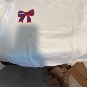 Cheryl added a photo of their purchase