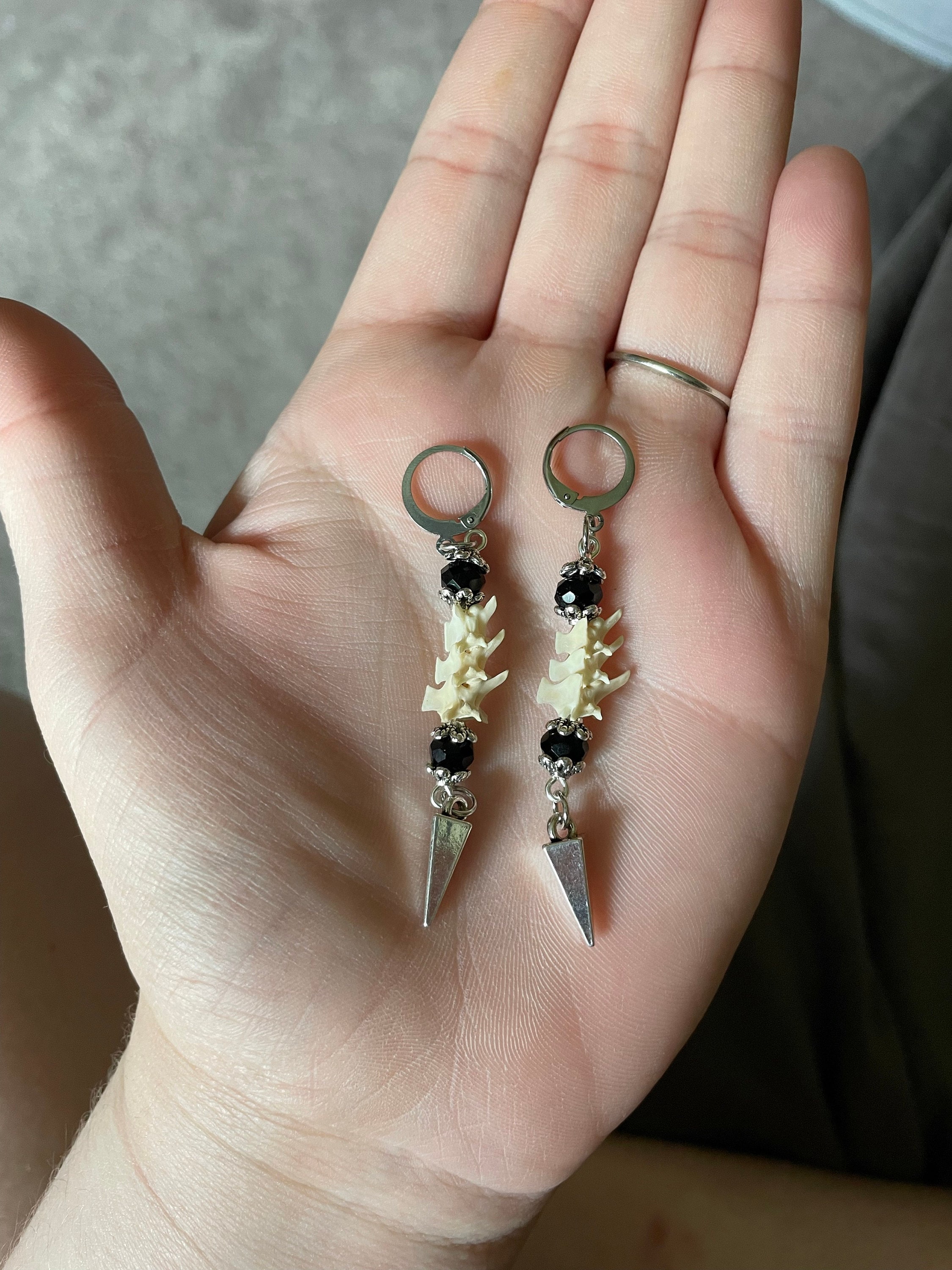 Exquisite Victorian-Era Inspired Coiled Rattlesnake Vertebrae Dangling, Earrings with Intricate Metalwork and Antique Brass Finish