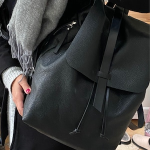 Sarah added a photo of their purchase