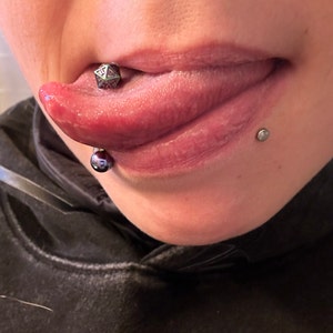 mens sexy santa union suit Tongue Snake Piercing main image 1