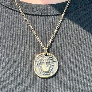 Ash added a photo of their purchase
