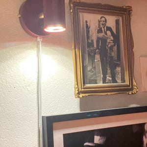 Natalie added a photo of their purchase