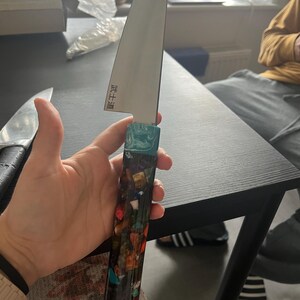 Carla added a photo of their purchase