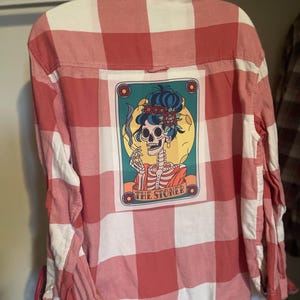 Sarah added a photo of their purchase