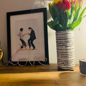 Janine added a photo of their purchase