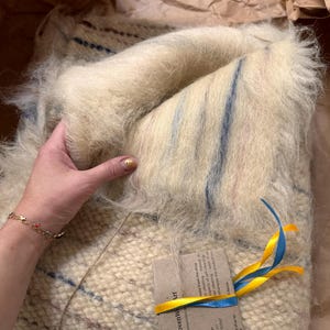 Tetyana added a photo of their purchase