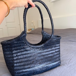 Aigerim added a photo of their purchase