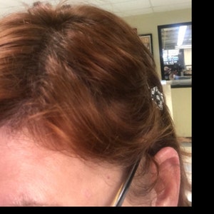 Christina added a photo of their purchase