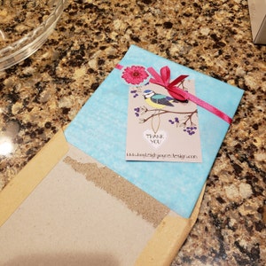 Kathleen added a photo of their purchase