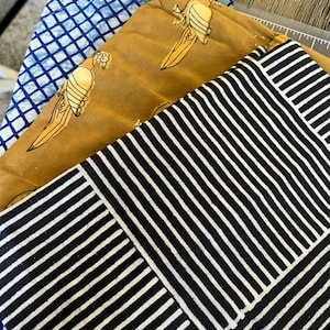 Noriko added a photo of their purchase