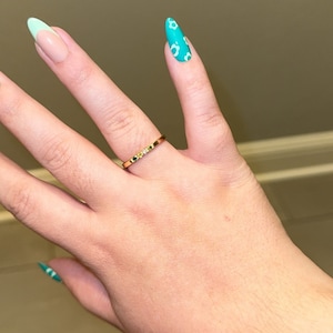 Kiara added a photo of their purchase