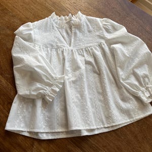 Gabrielle added a photo of their purchase