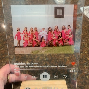 Gina added a photo of their purchase