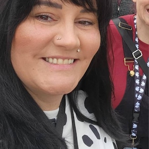 Cruella Disney ears.